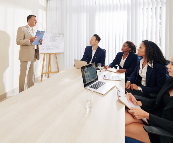Old CEO with a tablet