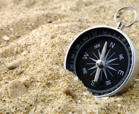 Compass in the sand